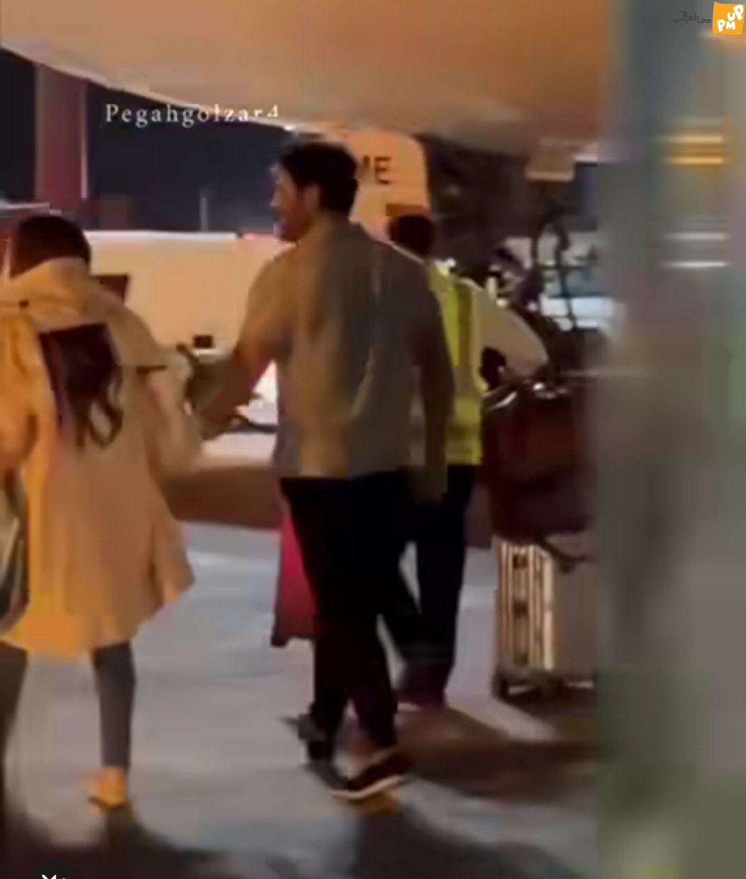 اولین عکس ثبت شده از محمدرضا گلزار و همسرش به سبک آیسان آقاخانی در فرودگاه + عکس اولین عکس ثبت شده از محمدرضا گلزار و همسرش به سبک آیسان آقاخانی در فرودگاه + عکس